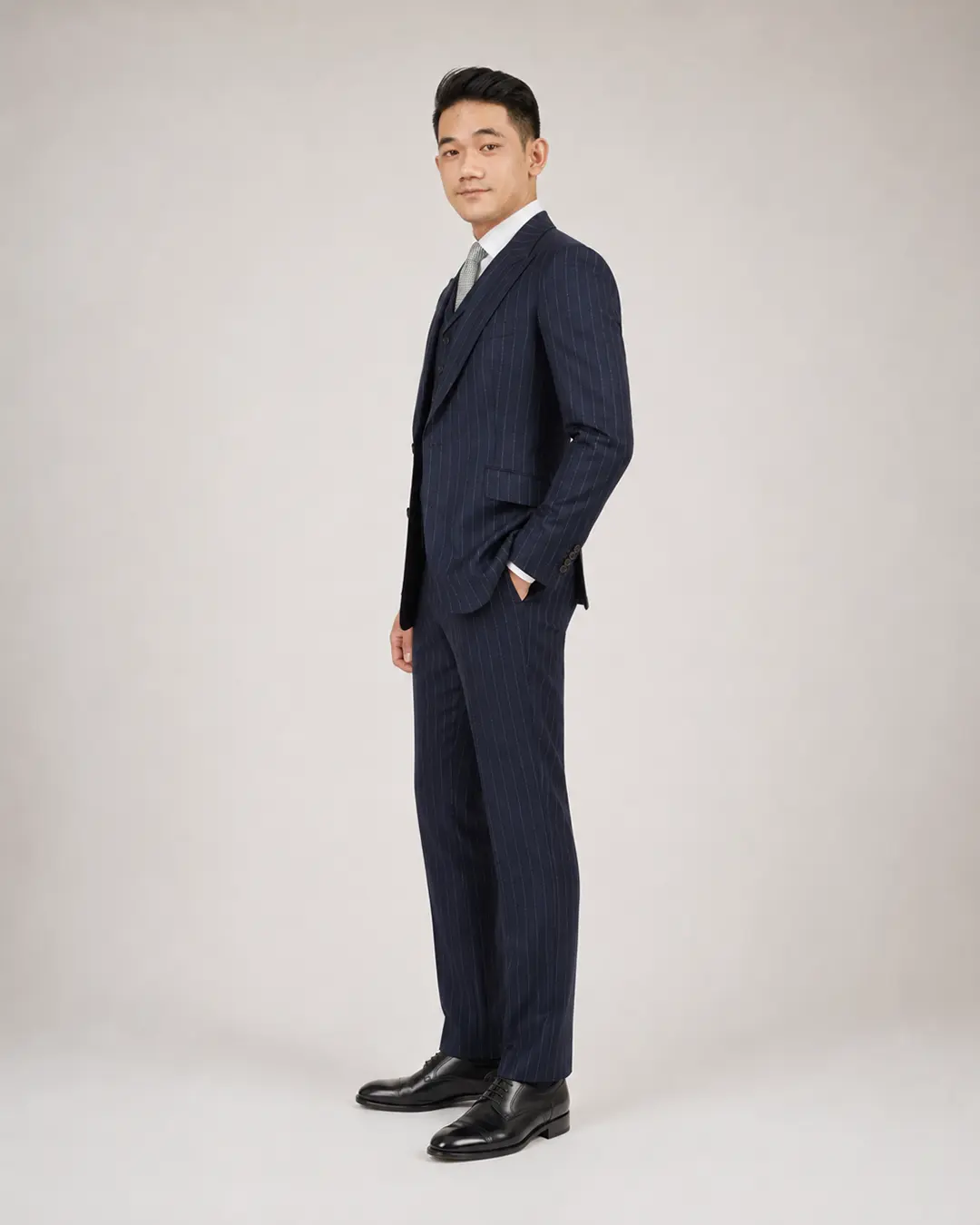 Navy Pinstripe Three-Piece Suit